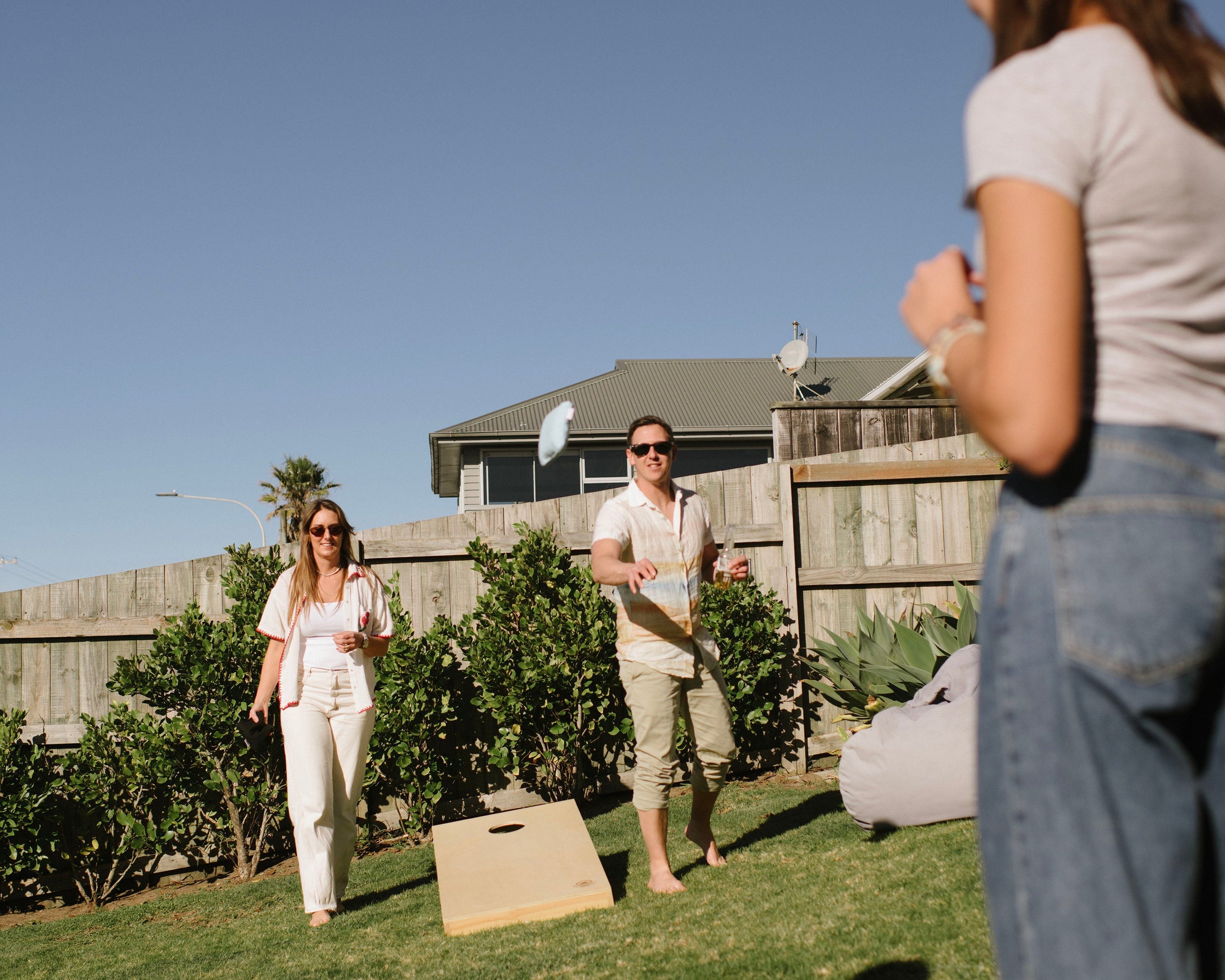 Cornhole tournament at a New Zealand backyard or corporate event