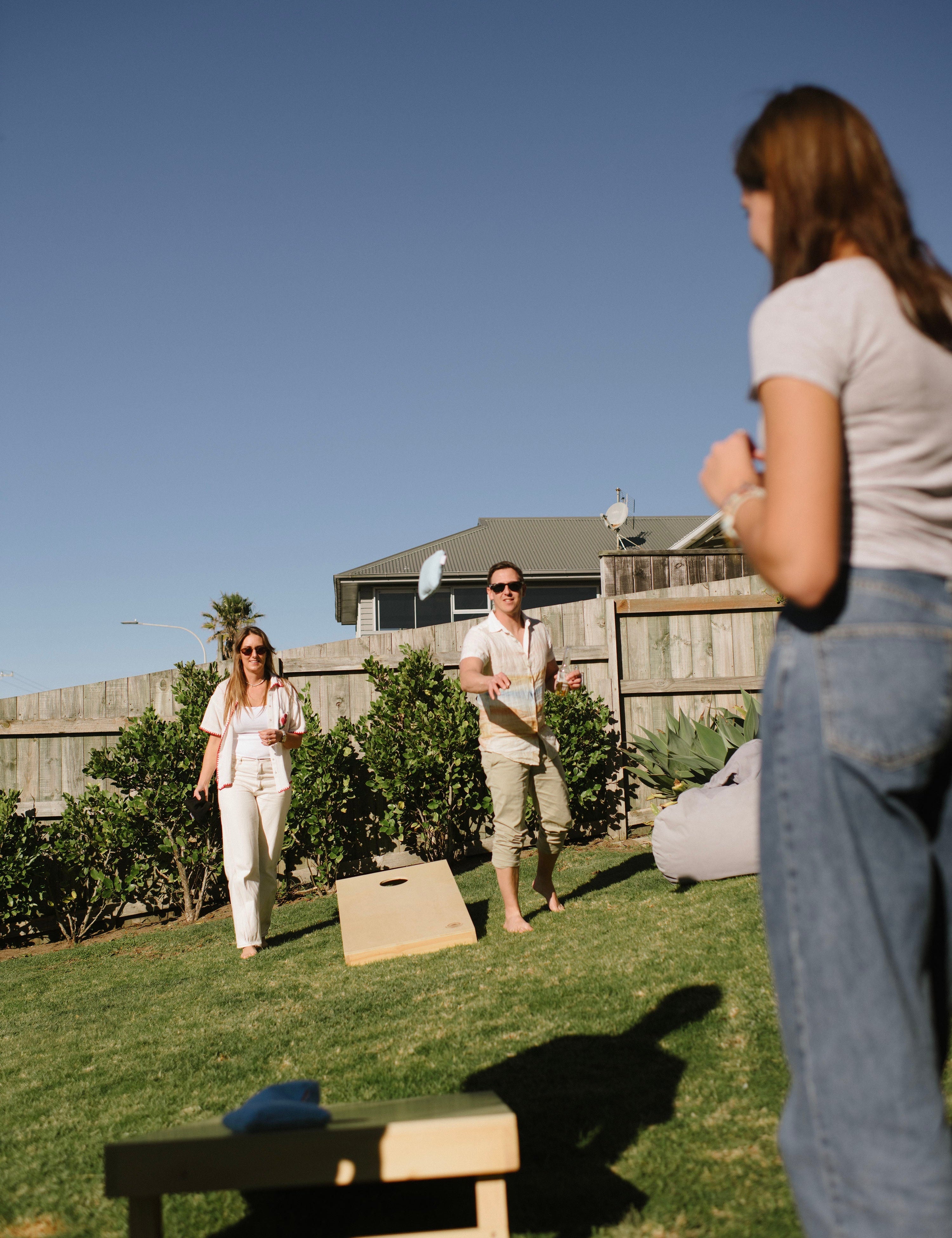 Cornhole tournament at a New Zealand backyard or corporate event