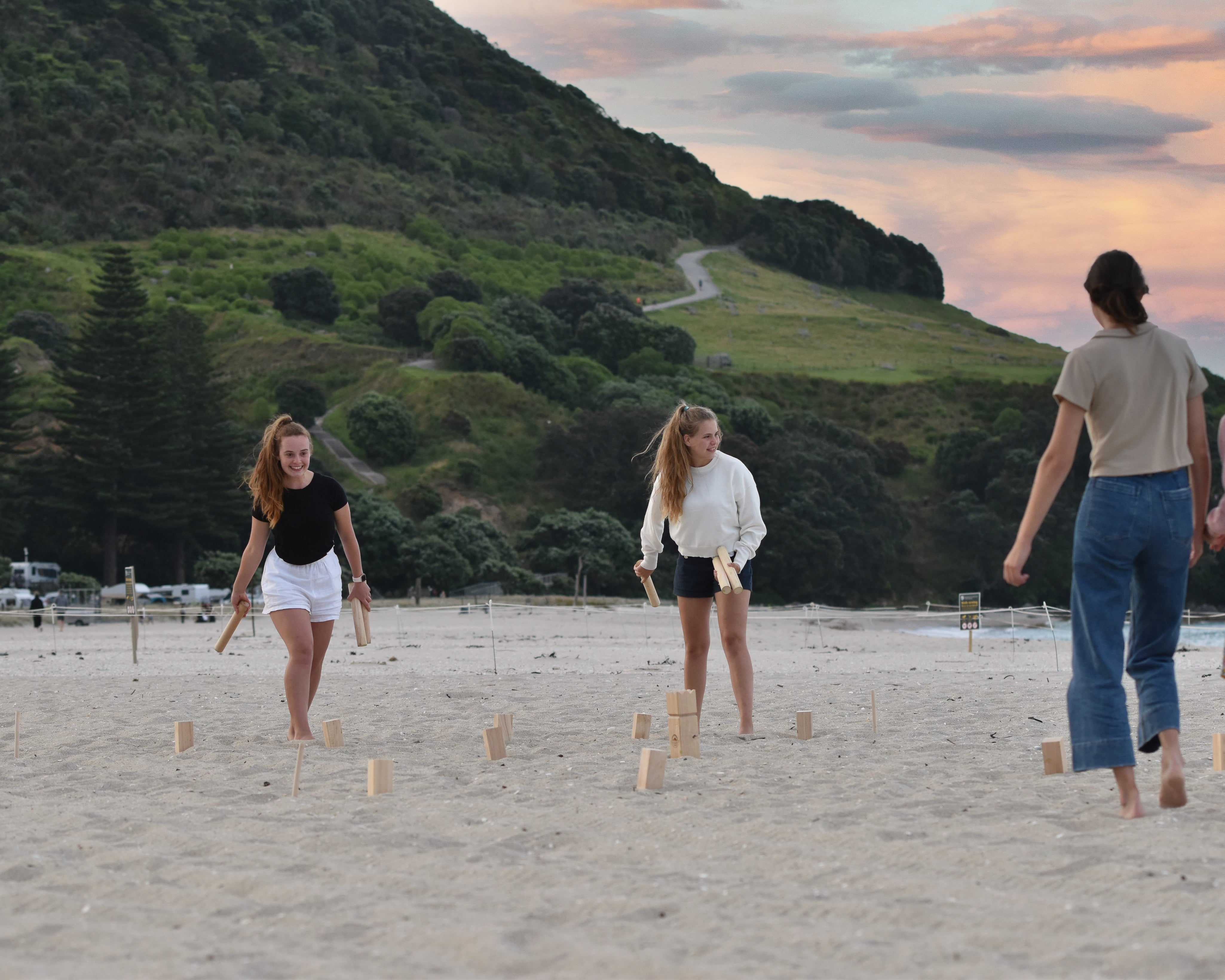 Family playing outdoor games in a New Zealand backyard over Easter long weekend