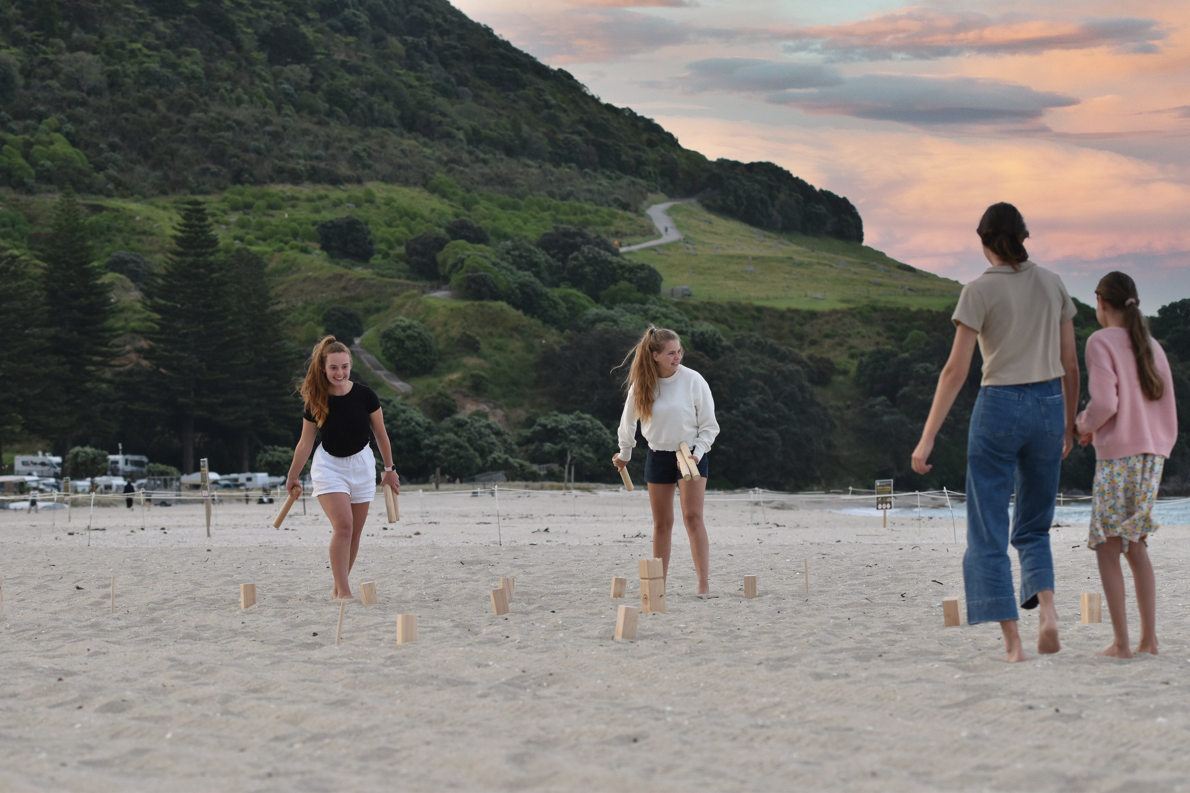 Family playing outdoor games in a New Zealand backyard over Easter long weekend