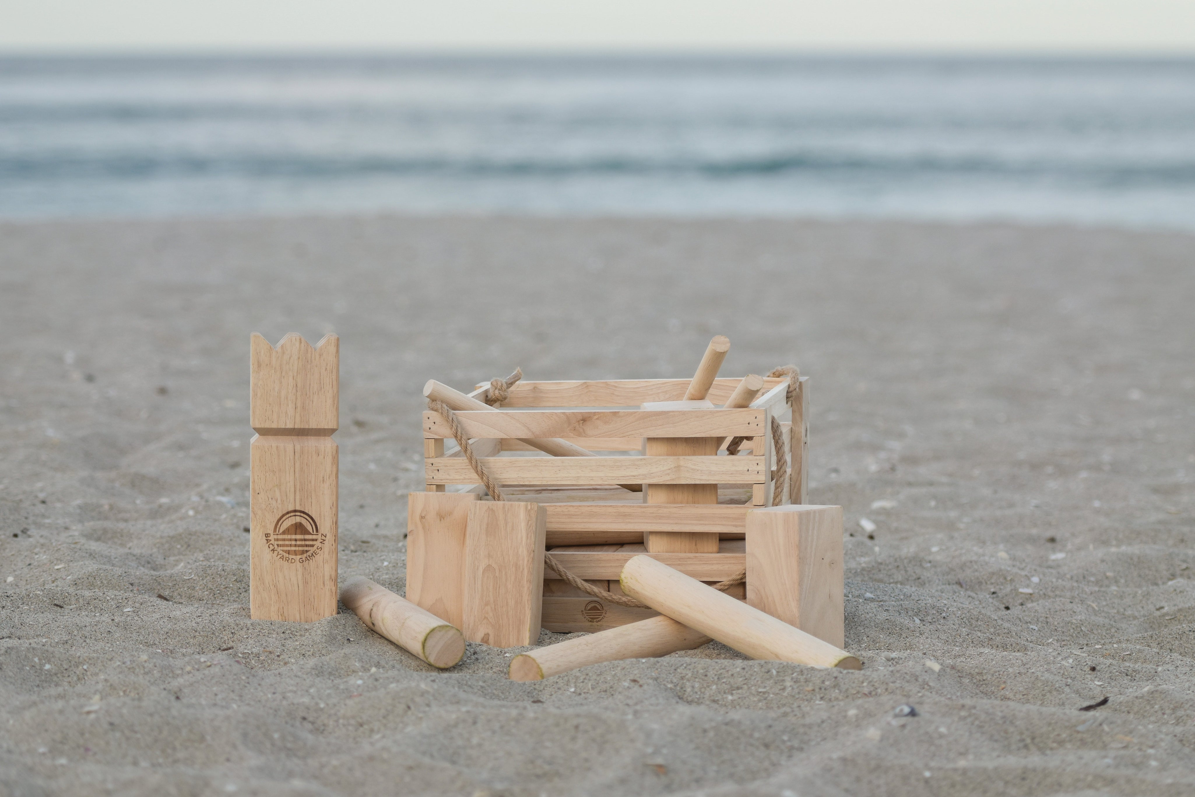Giant Kubb Set from backyard games nz on the becah