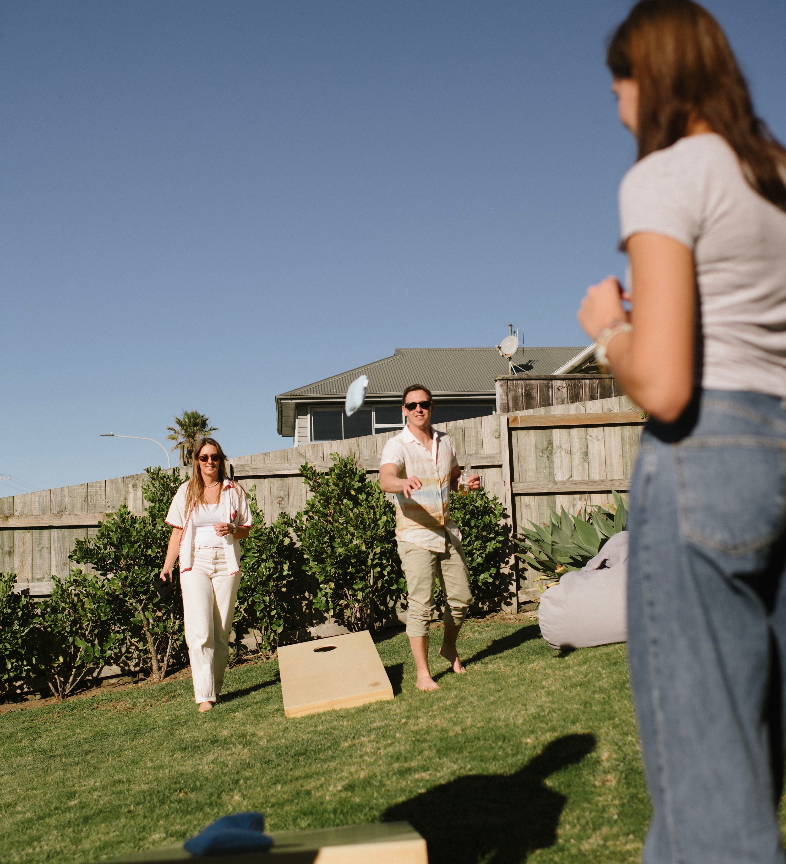 Cornhole tournament at a New Zealand backyard or corporate event