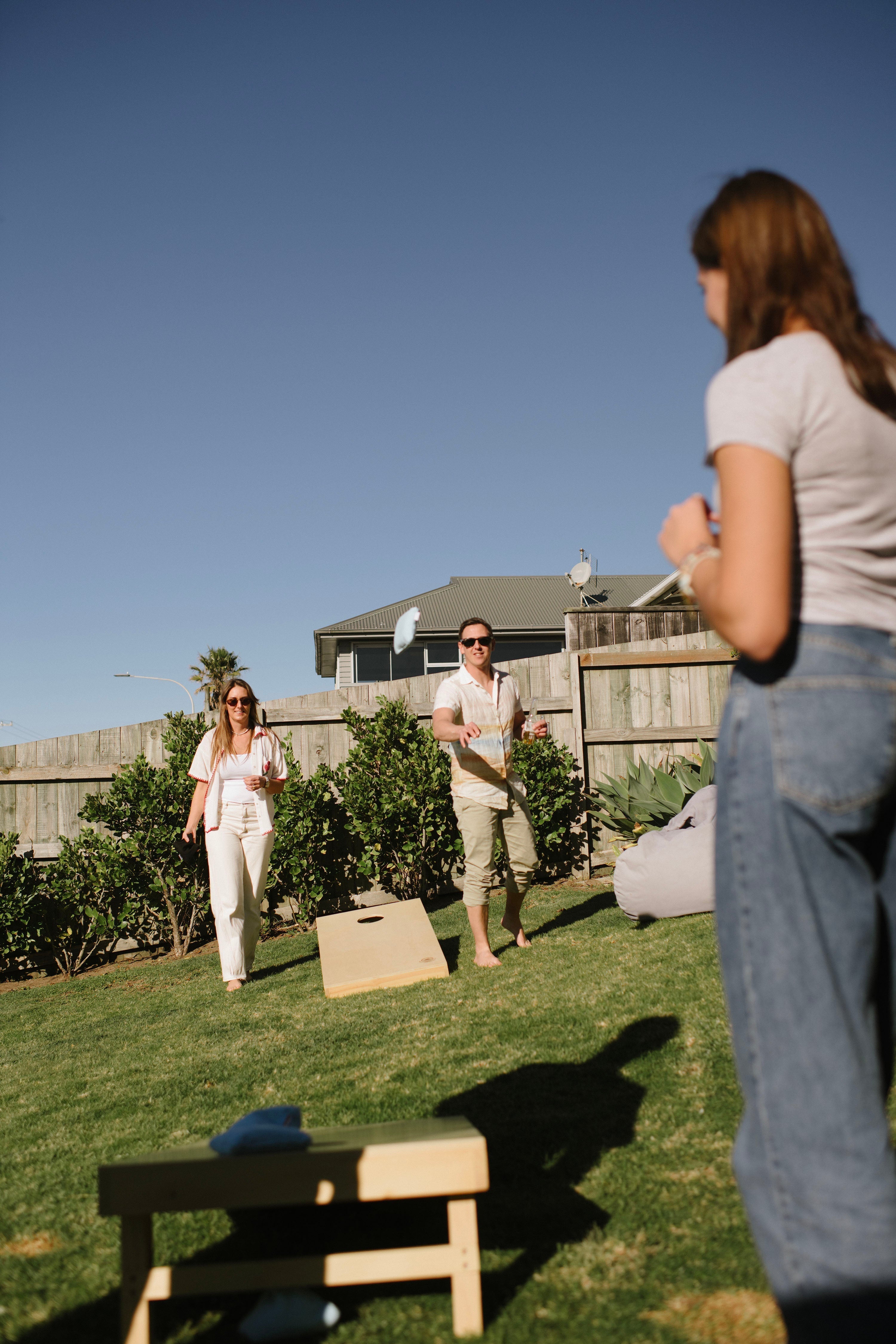 Cornhole tournament at a New Zealand backyard or corporate event