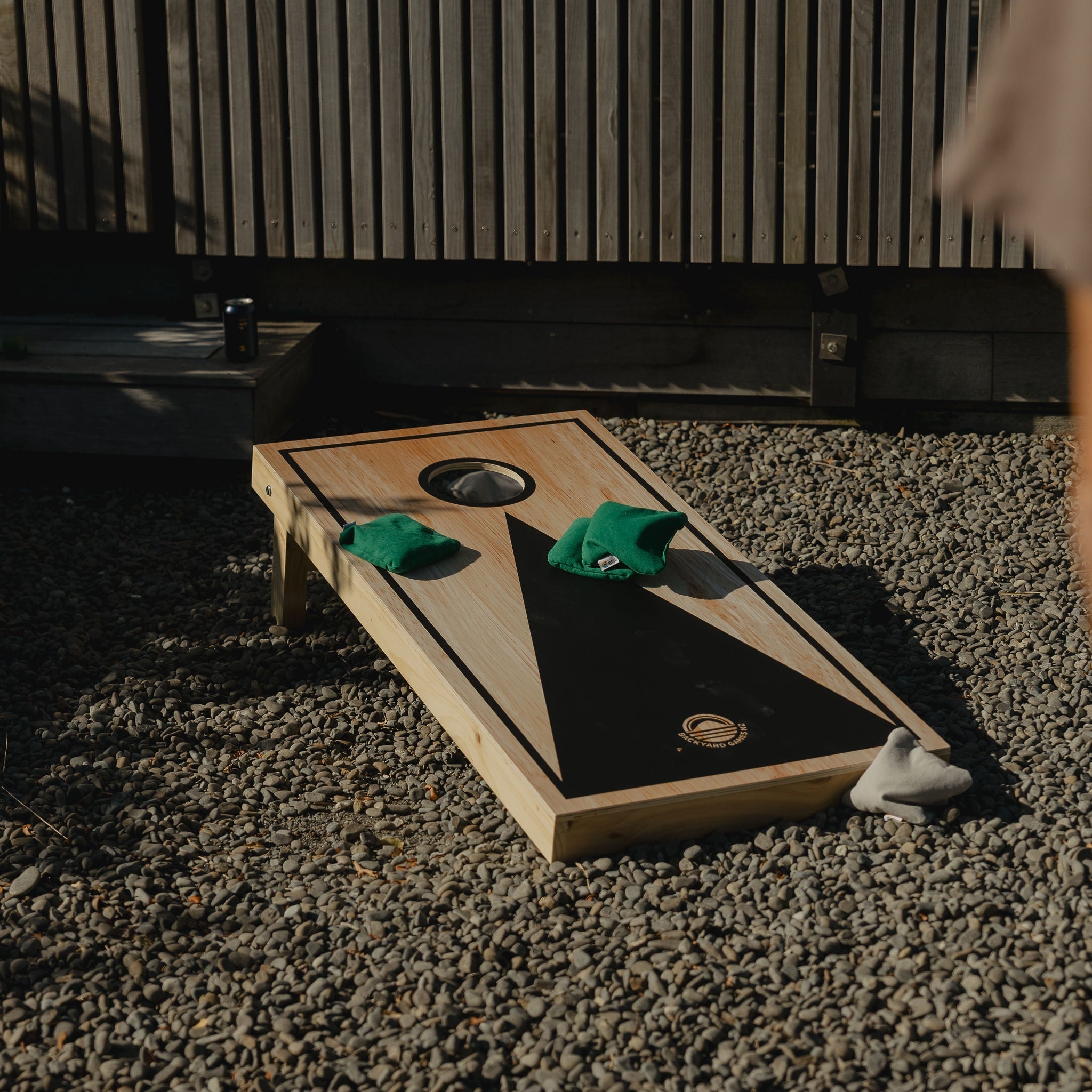Backyard Games Deluxe Cornhole board outside
