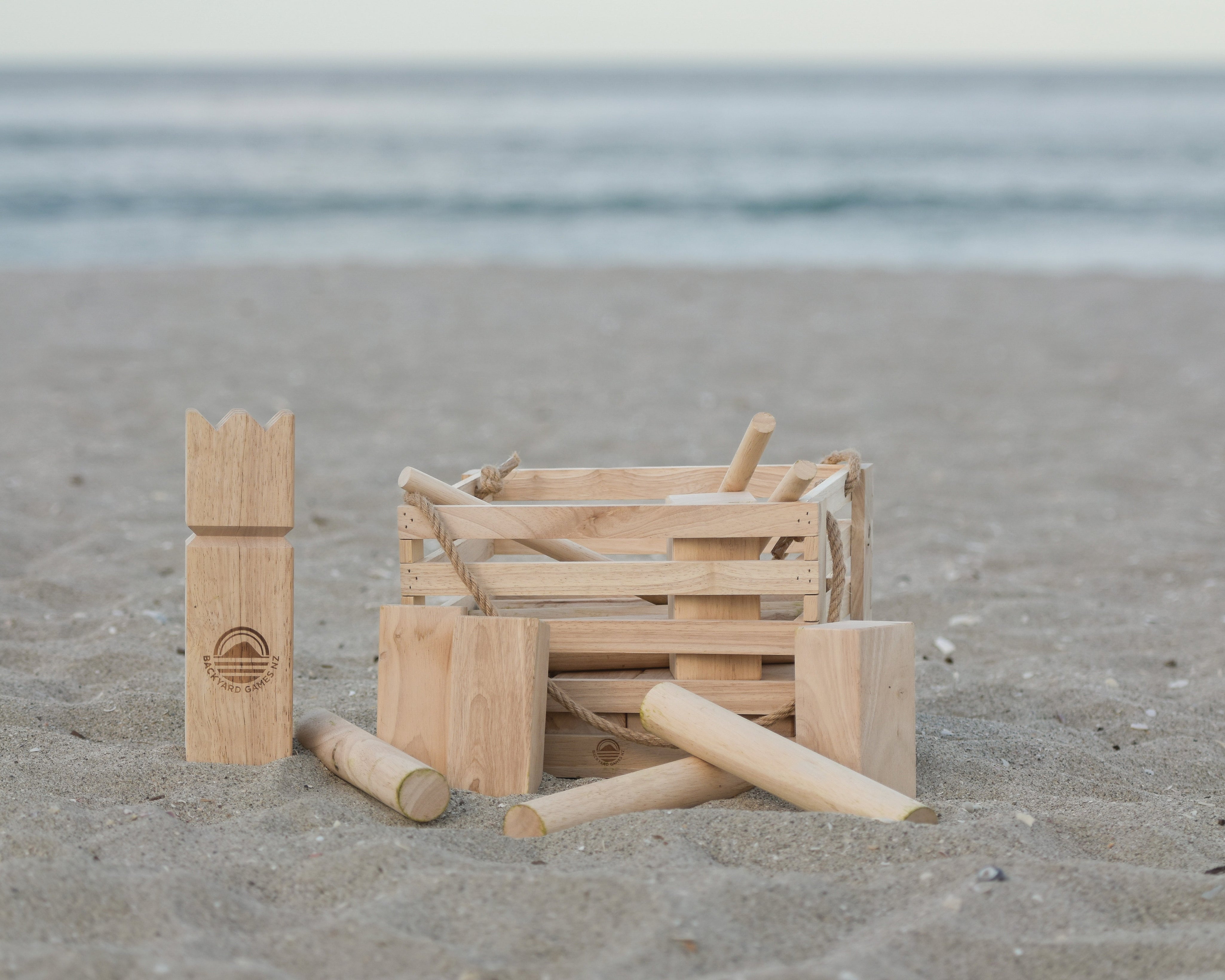 Giant Kubb Set from backyard games nz on the becah