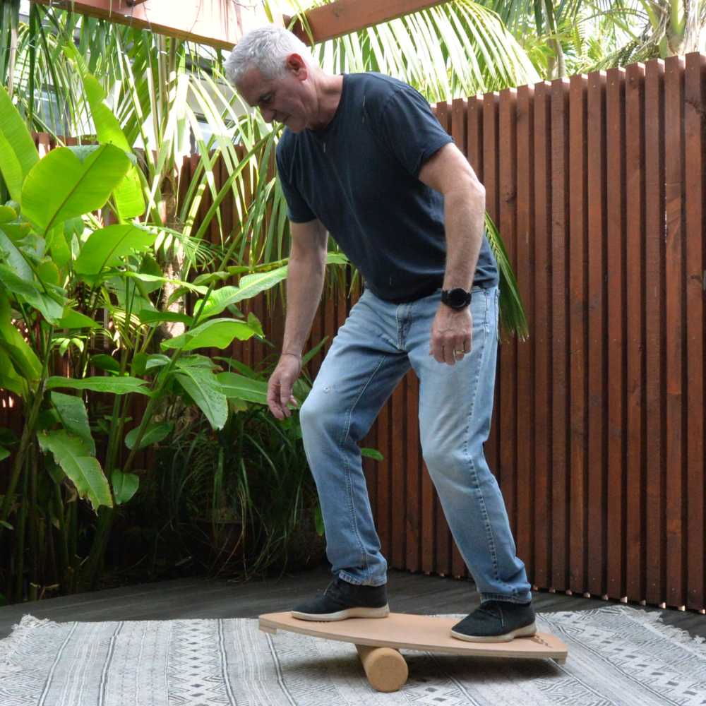 man playing on a balance board