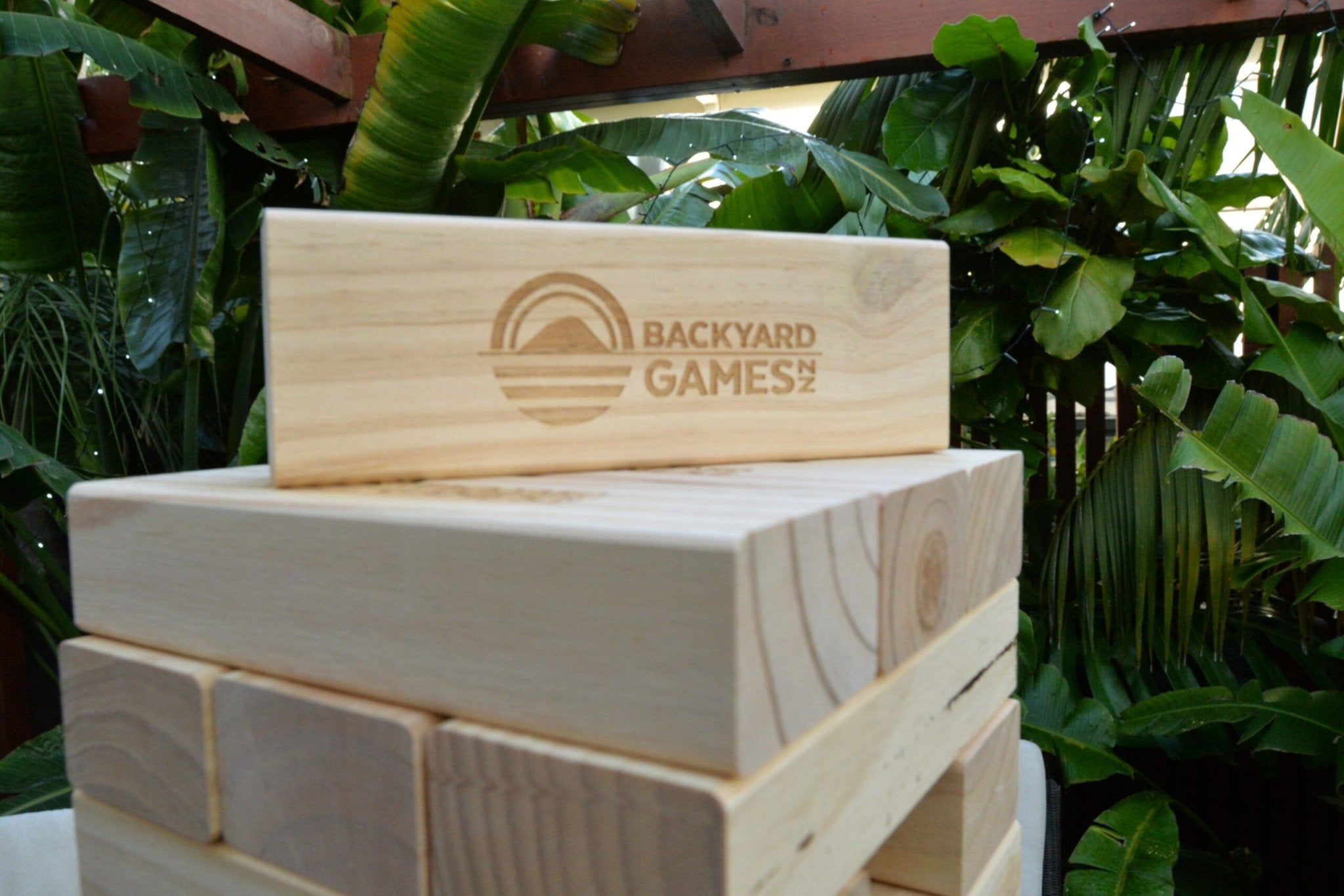 Backyard Chats Your Chats Tumbling Tower — custom engraved questions on solid pine blocks