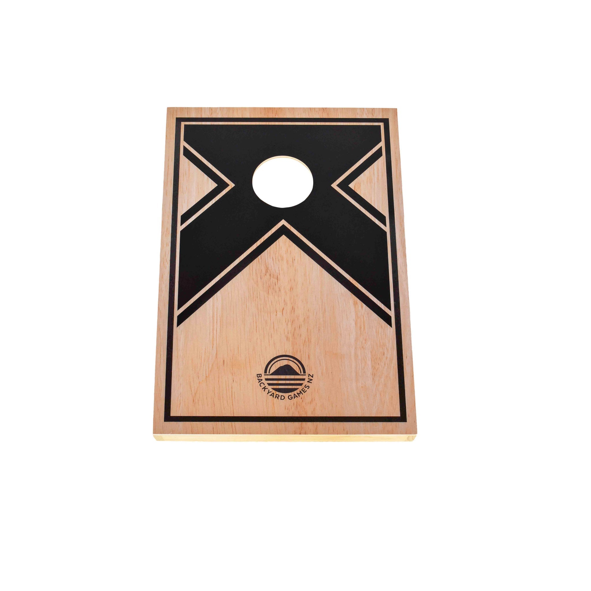 Close-up of black X graphic design on NZ pine and birch plywood cornhole board