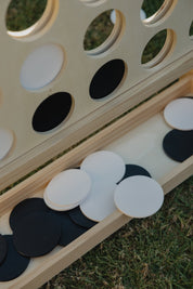 Close up of Giant Connect Four discs in tray 