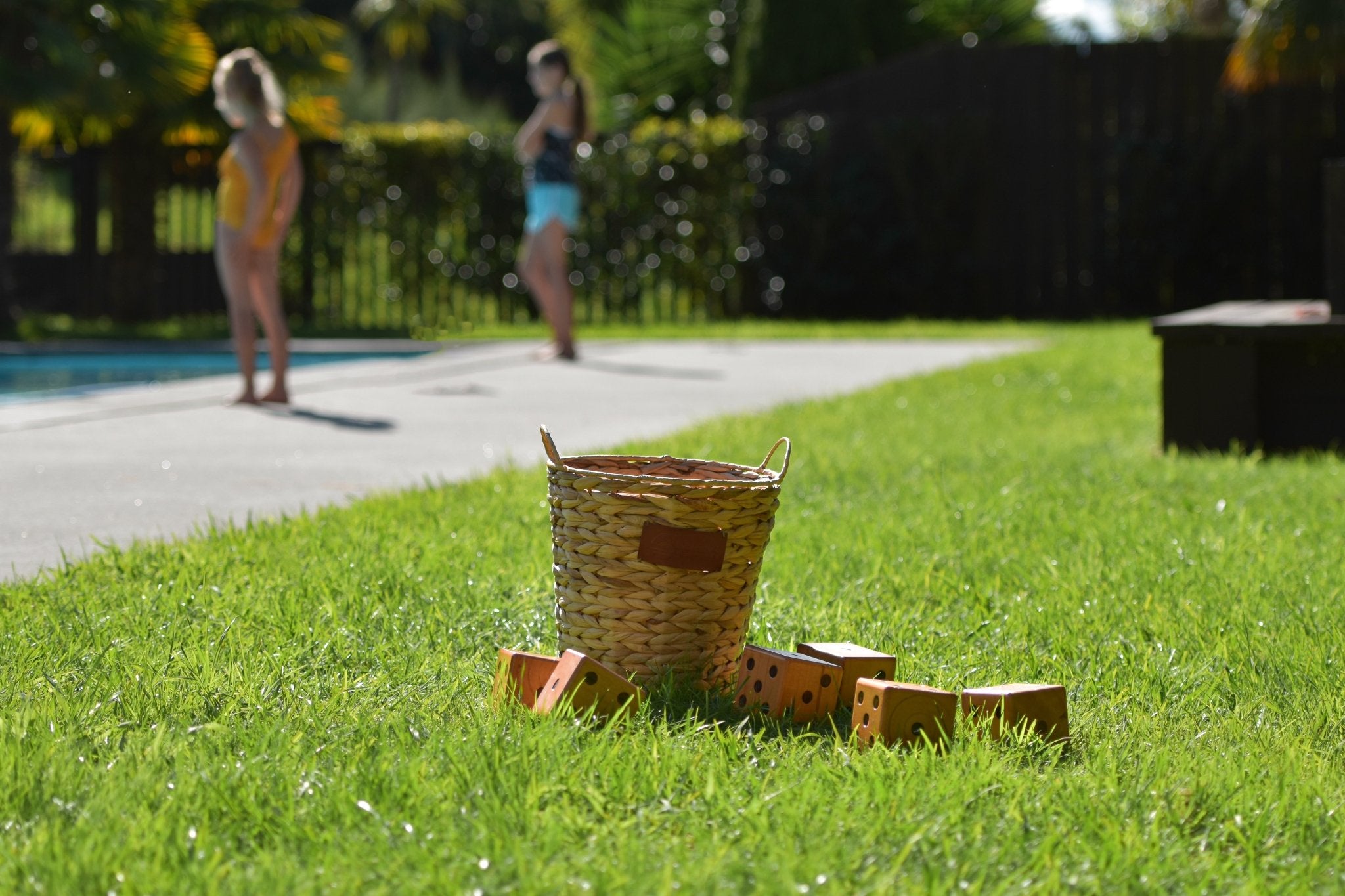 Backyard Games Yardzee and Farkle wooden dice set on the lawn